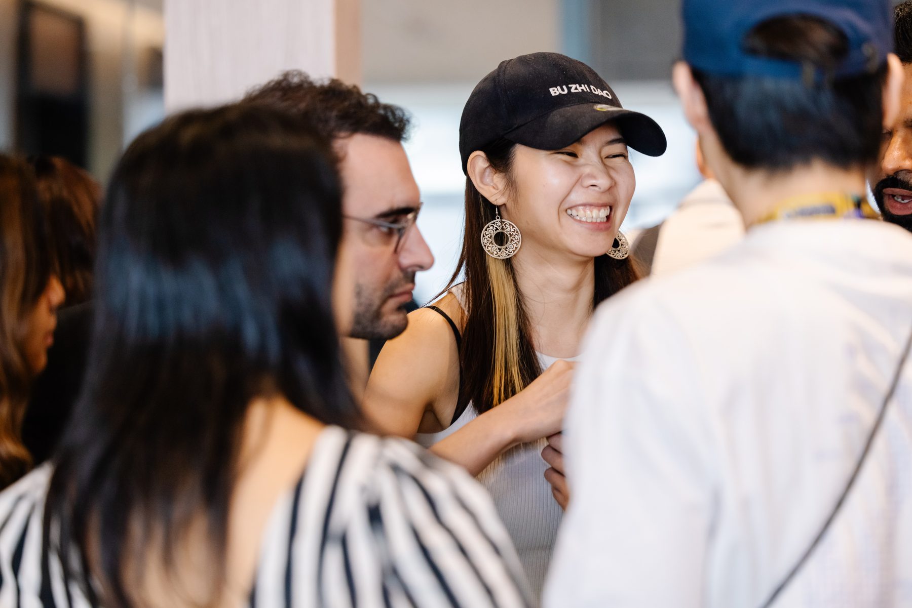 Two participants in conversation at Funding the Commons Bangkok 2024